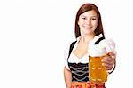 /Happy Bavarian woman holding Oktoberfest beer stein (Mass) in camera. Isolated on white background.