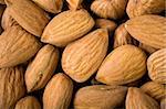Background of almonds, close up studio shot.