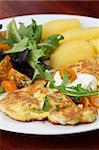 Zucchini omelet with eggs and blue cheese. Shallow DOF