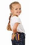 Little girl with lots of pencils in her pocket looking back - isolated