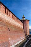 The wall and tower of big castle of red brick