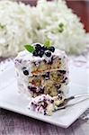 Delicious homemade blueberry cake with sour cream with a bite. Shallow DOF