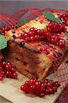 Homemade sponge cake with fresh organic red currants