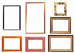 Collection of isolated empty picture frames on white background