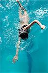 woman swimming on a pool