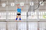 volleyball game sport with group of young beautiful  girls indoor in sport arena