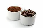 cups with coffee beans and blend. closeup