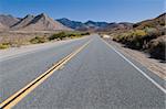 Highway through brown hills near Onyx, California