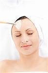 Relaxed woman having a beauty treatment in a spa center