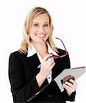 Charismatic businesswoman holding a clipboard against white background