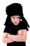 cute boy with a cap, angry, with arms crossed, isolated on white background, studio shot.