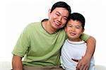 Asian father and son isolated on white