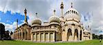 tourists admiring the mogul inspired regency architecture of brightons royal pavillion in sussex england