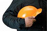 Orange helmet at man hands isolated on a white