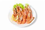 tasty shrimp with lemon and lettuce isolated on a white