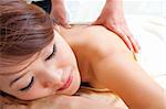 Beauty and Spa - Asian Girl having a massage on her back