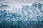 Reflection of the Antarctic Glacier with icicles