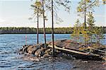 Canoe on rocky island on northern lake