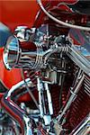 Shiny v-twin motorbike engine of a customized chopper bike