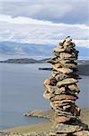 Landscape, view from hill on Baikal.Siberia. A conglomeration of stones made by shaman.