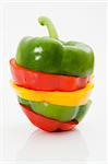 Sliced and mixed sweet pepper on a white background