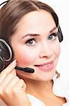 Pretty caucasian woman with headset smiling during a telephone conversation.