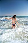 woman at beach of palmar in cadiz spain