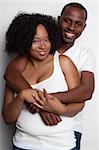 Loving black couple hugging