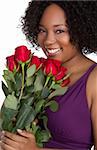 Woman holding red roses