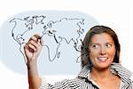 A portrait of a young beautiful woman drawing a world map over white background