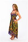 Beautiful young brown haired girl in a long paisley dress