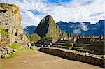 Ruins of stone houses at Machu Picchu, Peru
