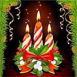Christmas candles, holly, mistletoe and ribbon