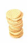 Stack of golden shortbread butter  biscuits with one facing the camera