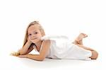 Little angel in white dress laying on the floor - isolated with a bit of shadow
