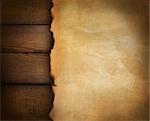 Closeup of parchment paper on wood background