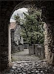 Ancient arch pathway on a Bar old town in Montenegro