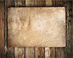 old paper on Grunge wood wall background
