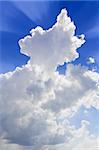 Clouds with the rays on a blue sky