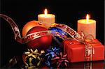 Christmas decoration with candles on a black background