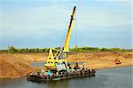 floating excavator - development sandpit with dredge