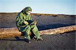 Environmental scientist working in the zone of ecological disaster