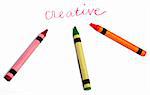 The Word Creative Handwritten with Several Vibrant colored Crayons on White.