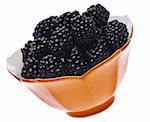 Fresh Blackberries in an Orange Bowl Isolated on White with a Clipping Path.