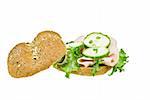 Fresh ham and cucumber sandwich over white background