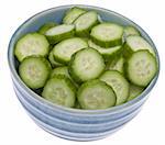 Fresh blue bowl of sliced cucumbers isolated on white with a clipping path.