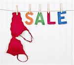 Vibrant Image for Your Next SALE featuring the word SALE and a Red Bra.