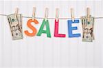 Vibrant Image for Your Next SALE featuring the word SALE and American Currency.