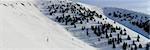 Man on the snowy slopes in avalanche area