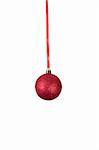 Red Christmas Ball hanging on a red Band